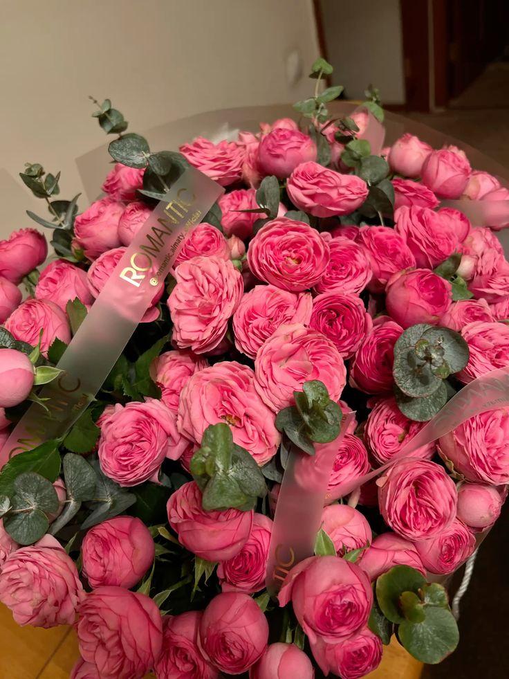 SaffronDriftNovel workshop space where corporate flower arrangements are designed and prepared for business delivery